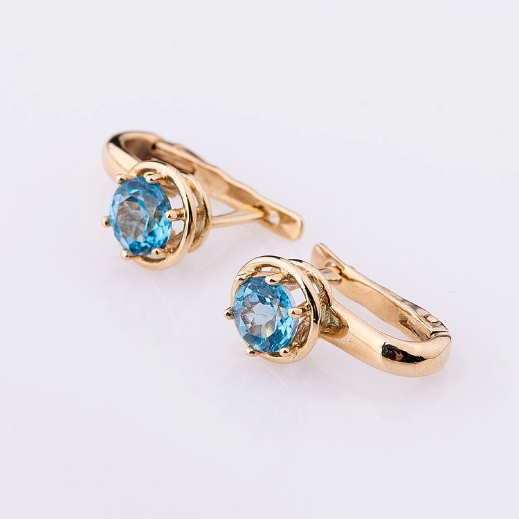 Золотые серьги с голубым топазом с02833 от ювелирного магазина Оникс