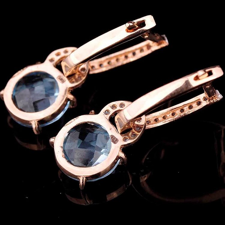 Золоті сережки (блакитний топаз і фіаніти) с02850 від ювелірного магазину Онікс - 1