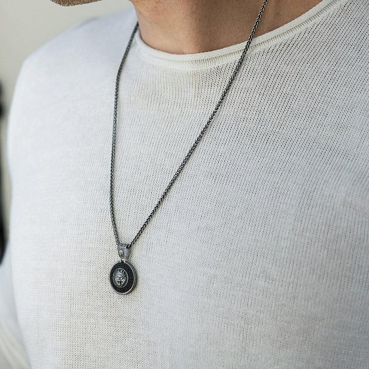 Срібний кулон "Знак зодіаку Лев" з ебеном 1041лев від ювелірного магазину Онікс - 1