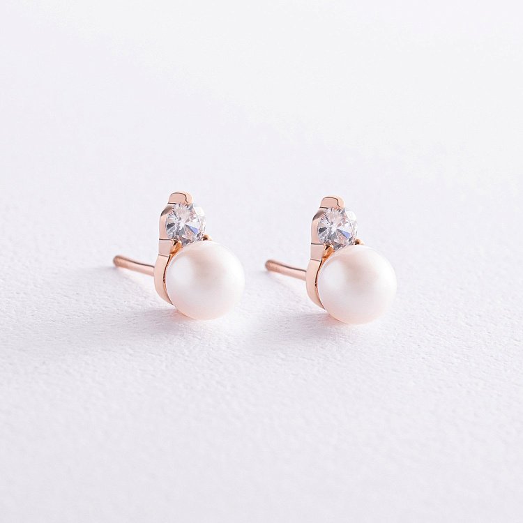 Золоті сережки - пусети з перлами і фіанітами с07952 від ювелірного магазину Онікс