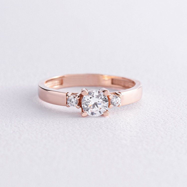 Золотое кольцо с фианитами к07029 от ювелирного магазина Оникс