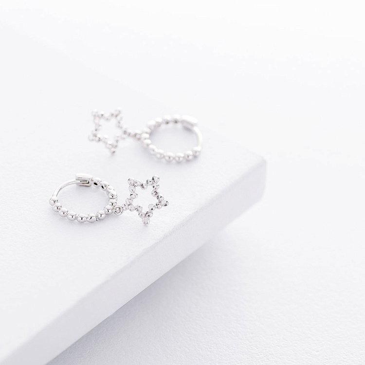 Золотые серьги со звездочками с06176 от ювелирного магазина Оникс - 1