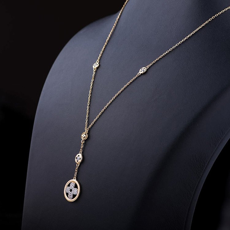 Золотое колье "Клевер" с фианитами кол01045 от ювелирного магазина Оникс