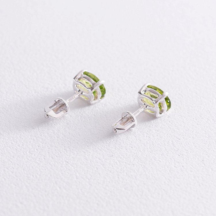 Срібні сережки-пусети з перидотом 6х8 121960 від ювелірного магазину Онікс - 2