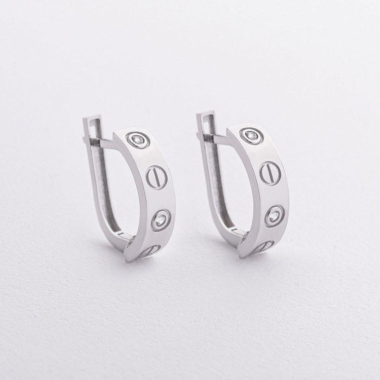 Сережки "Love" з фіанітами (біле золото) с09316 від ювелірного магазину Онікс