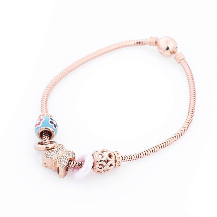 Золотой браслет с подвесками б03120с от ювелирного магазина Оникс