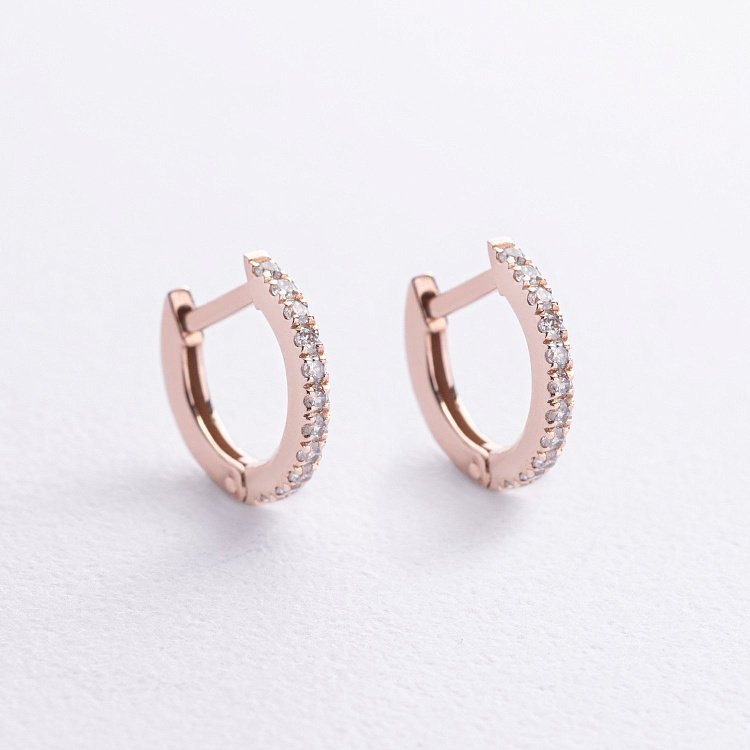 Золоті сережки з фіанітами с09070 від ювелірного магазину Онікс