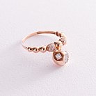 Золотое кольцо с фианитами к04933 от ювелирного магазина Оникс