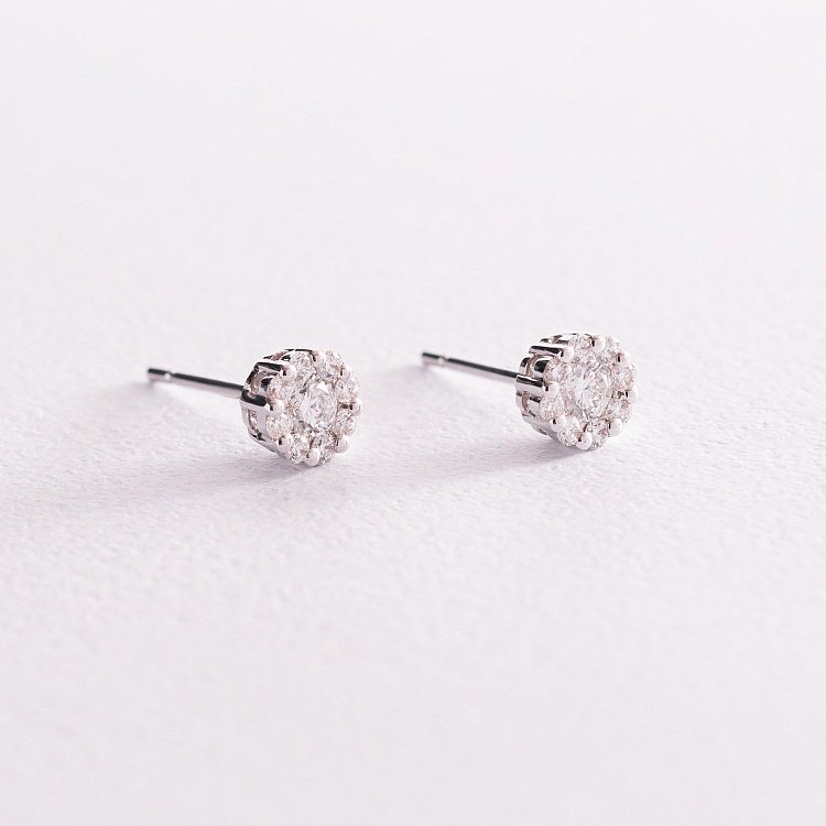 Золоті сережки-пусети з діамантами сб0225са Золоті сережки-пусети з діамантами сб0225са від ювелірного магазину Онікс