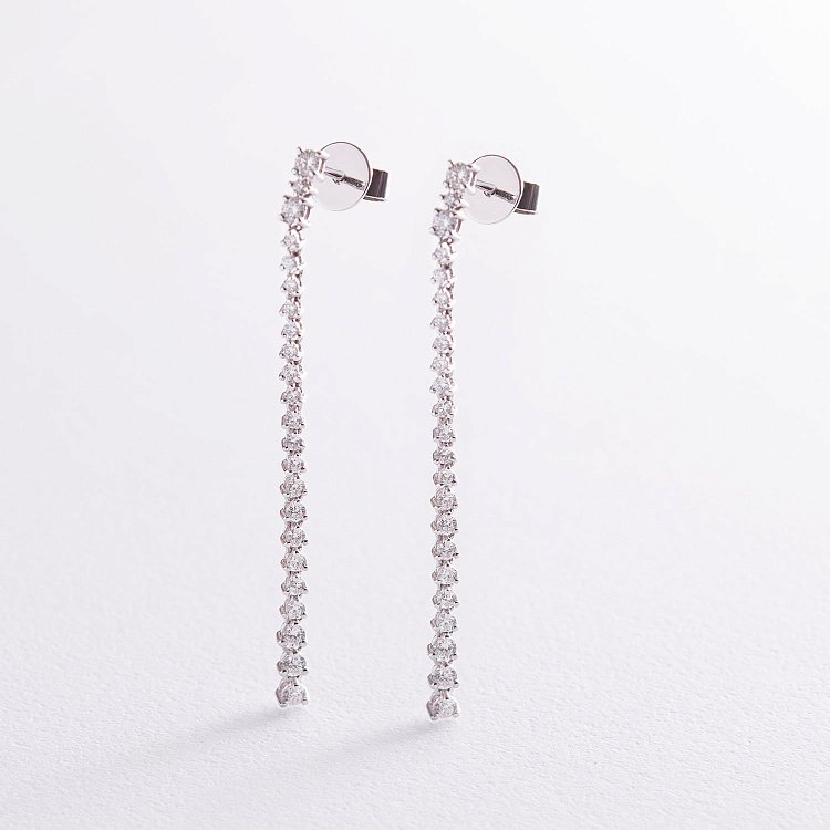 Золотые серьги - пусеты с бриллиантами E00615mi от ювелирного магазина Оникс