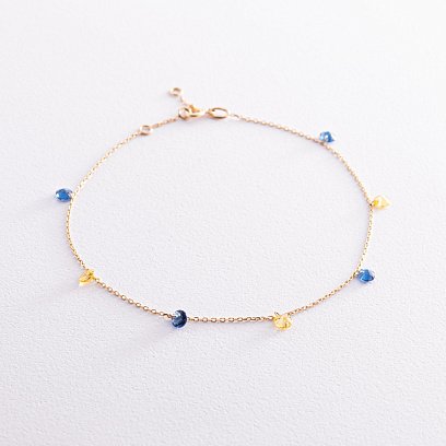 Золотий браслет "Українка" на ногу (сині та жовті фіаніти) б05118