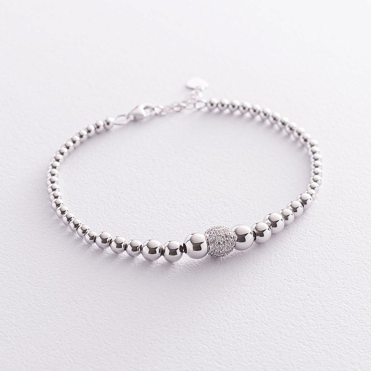 Браслет "Кульки" в білому золоті (фіаніти) б04701 від ювелірного магазину Онікс