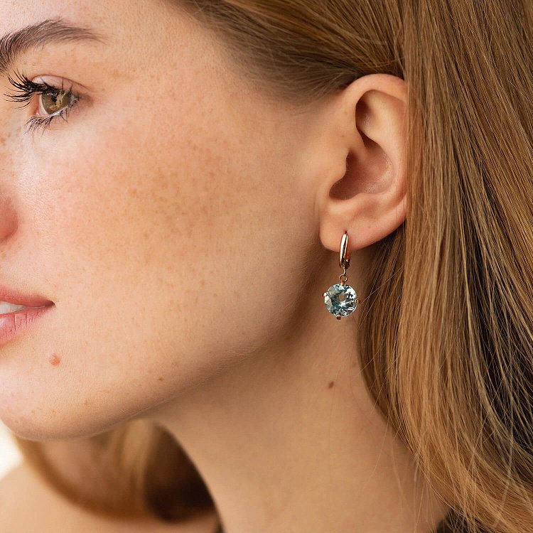 Золотые серьги "Влечение" с голубым топазом с05295 от ювелирного магазина Оникс - 2