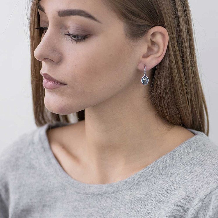 Золотые серьги с голубым топазом 14048690 от ювелирного магазина Оникс - 1