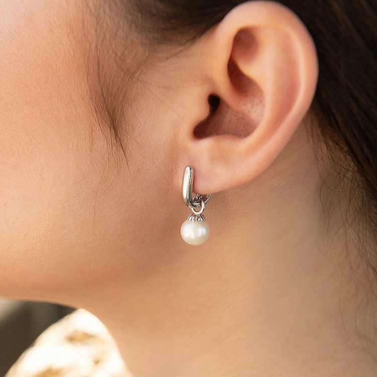 Золоті сережки з перлами с05836 від ювелірного магазину Онікс - 2