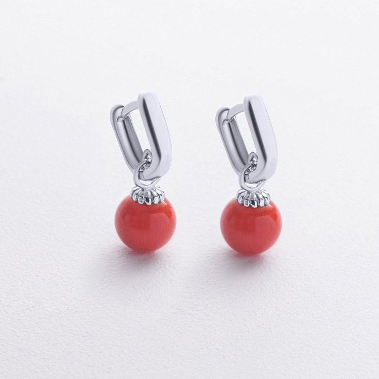 Сережки з коралом (біле золото) с08741 від ювелірного магазину Онікс