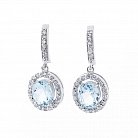 Срібні сережки з блакитним топазом і фіанітами 121460 от ювелирного магазина Оникс