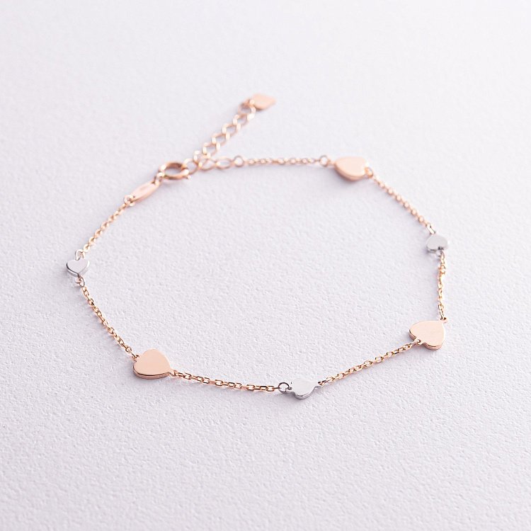 Золотий браслет "Сердечки" б04021 від ювелірного магазину Онікс