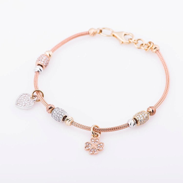 Золотий браслет "Серце і конюшина" з фіанітами б02659 від ювелірного магазину Онікс