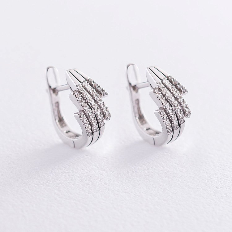 Золоті сережки з діамантами T03105E від ювелірного магазину Онікс