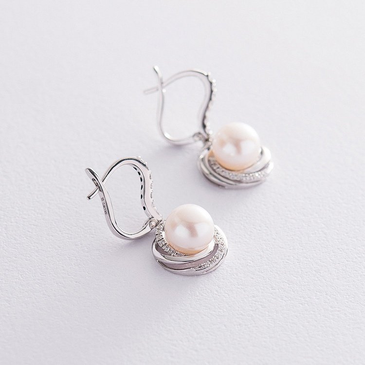 Золоті сережки з перлами і діамантами сжд2-051 від ювелірного магазину Онікс - 1