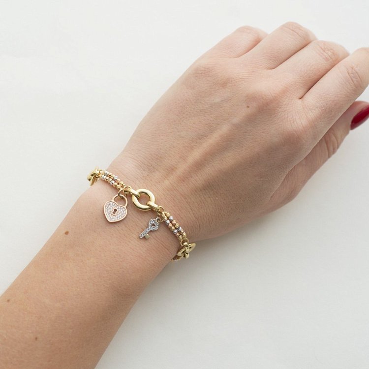 Золотий браслет "Серце і ключик" (фіаніти) б02379 від ювелірного магазину Онікс - 2