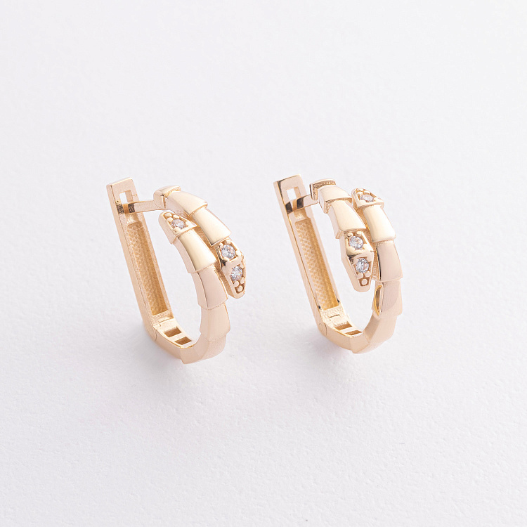 Серьги "Змеи" в желтом золоте (фианиты) с09461 от ювелирного магазина Оникс