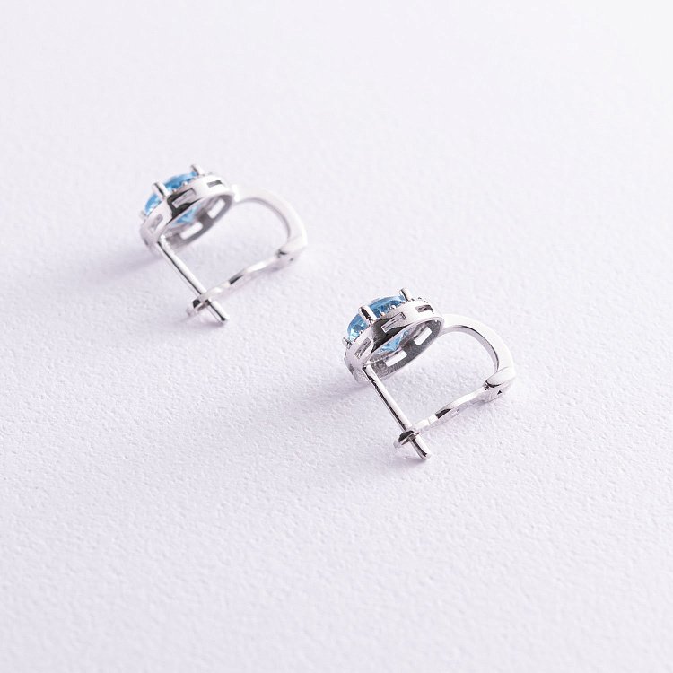 Золотые серьги с голубым топазом и фианитами с04167 от ювелирного магазина Оникс - 2