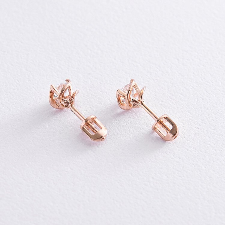 Золоті сережки - пусети з блакитними топазами с02281 від ювелірного магазину Онікс - 2