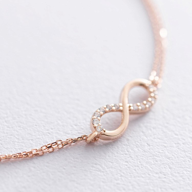 Золотий браслет "Нескінченність" з фіанітами б04544 від ювелірного магазину Онікс - 2