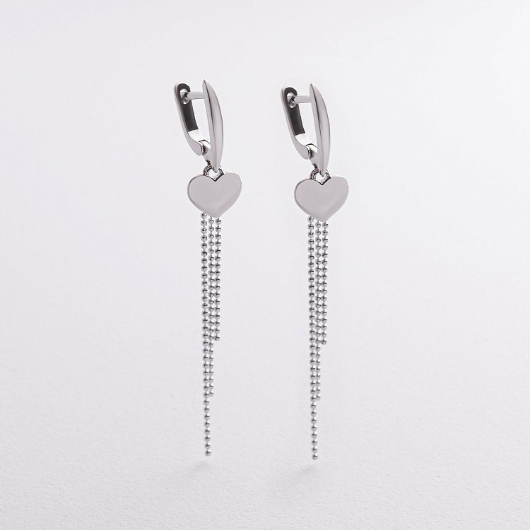 Висячі сережки "Сердечки" у сріблі 123485 Висячі сережки "Сердечки" у сріблі 123485 від ювелірного магазину Онікс
