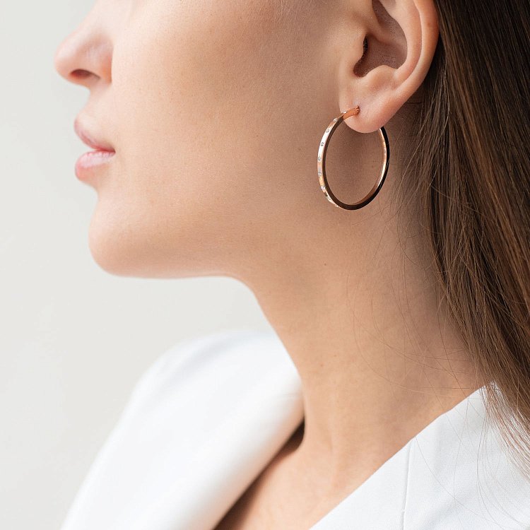 Золоті сережки-кільця (фіаніти) с02633 від ювелірного магазину Онікс