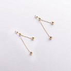 Серьги - пусеты с шариками на цепочке (желтое золото) 580142м от ювелирного магазина Оникс