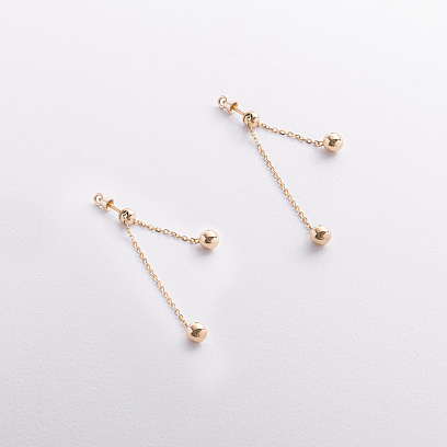 Серьги - пусеты с шариками на цепочке (желтое золото) 580142м