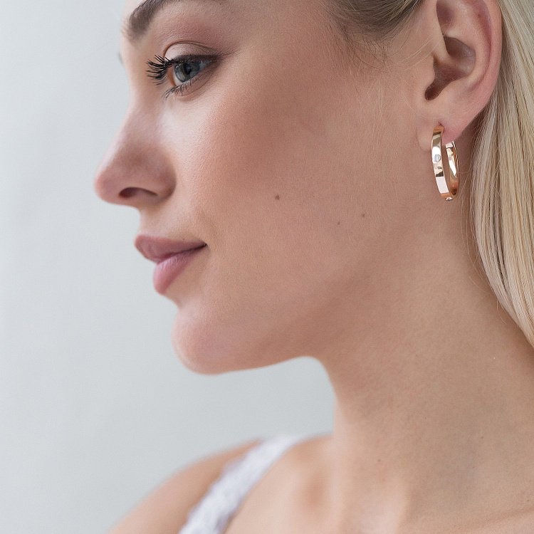 Овальні сережки без каменів с06505 від ювелірного магазину Онікс - 1