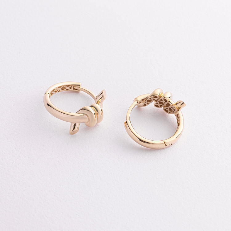 Сережки - кільця "Brigitte" у жовтому золоті с09561 від ювелірного магазину Онікс - 1