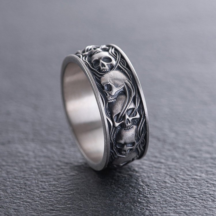Чоловічий срібний перстень з черепами 7123 від ювелірного магазину Онікс