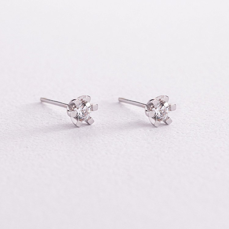 Золоті сережки - пусети з фіанітами с05854 від ювелірного магазину Онікс