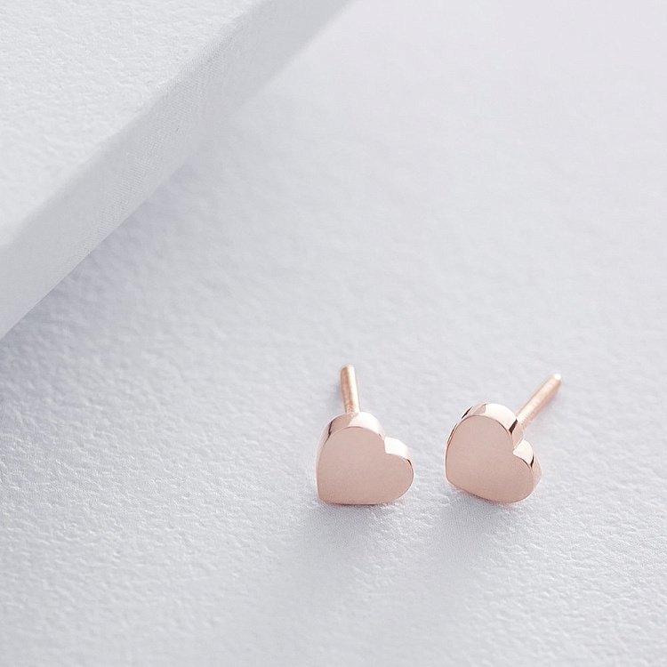 Золоті сережки - пусети "Сердечки" с06049 від ювелірного магазину Онікс