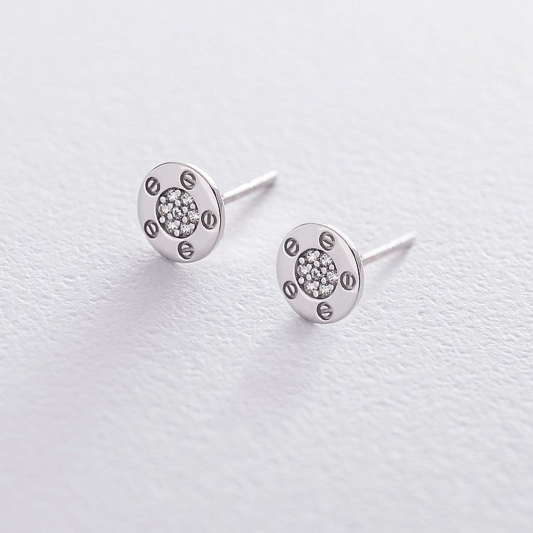 Золоті сережки-пусети з фіанітами с06418 від ювелірного магазину Онікс