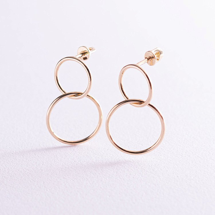 Серьги-пусеты "Кольца" в желтом золоте с06988 от ювелирного магазина Оникс