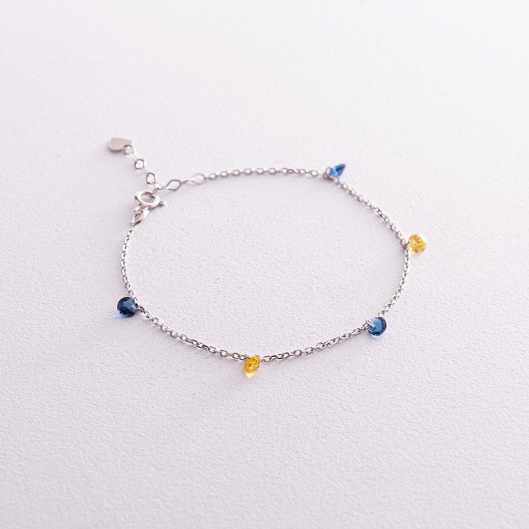 Браслет "Украинка" в серебре (синие и желтые фианиты) 141610 от ювелирного магазина Оникс