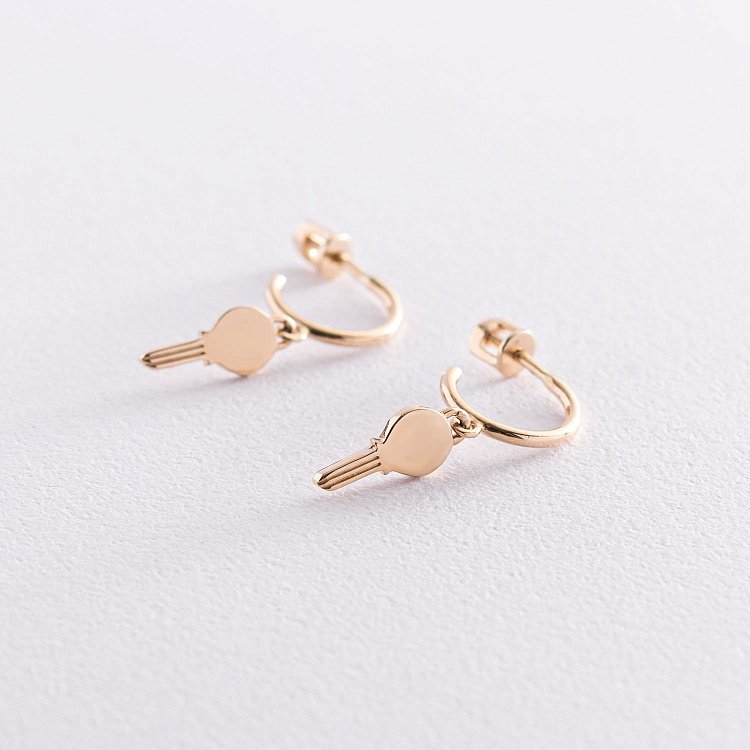 Золоті сережки - пусети "Ключики" с07394 від ювелірного магазину Онікс - 1