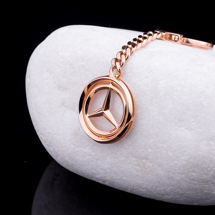 Золотой брелок "Mercedes-Мерседес" бр00001мрс Золотой брелок "Mercedes-Мерседес" бр00001мрс от ювелирного магазина Оникс