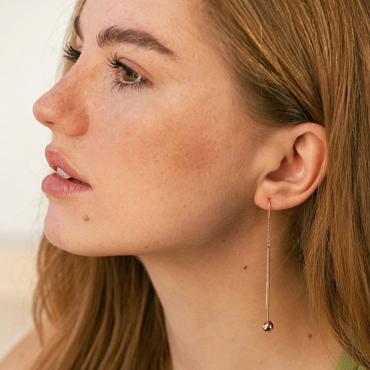 Золоті сережки "Кульки" на ланцюжку с08825 від ювелірного магазину Онікс - 1