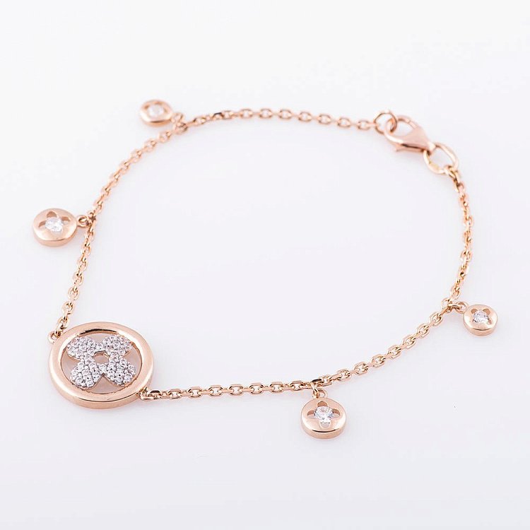 Золотий браслет "Конюшина" з фіанітами б02747 від ювелірного магазину Онікс