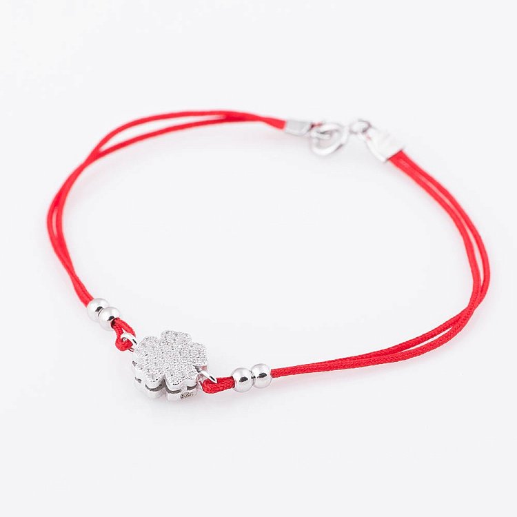 Браслет с красной нитью и цветочком 141156 от ювелирного магазина Оникс