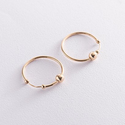 Сережки - кільця Гармонія в жовтому золоті с07314
