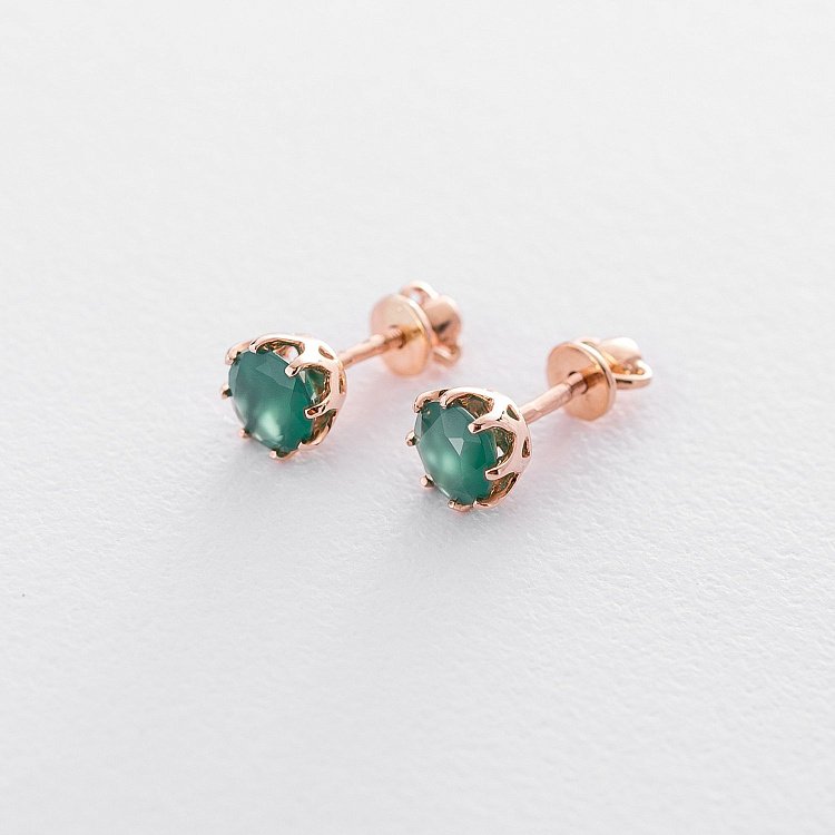 Золоті сережки-пусети з оніксом с06309 від ювелірного магазину Онікс