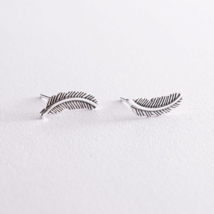 Срібні сережки - пусети "Пір'їнки" 123200 від ювелірного магазину Онікс